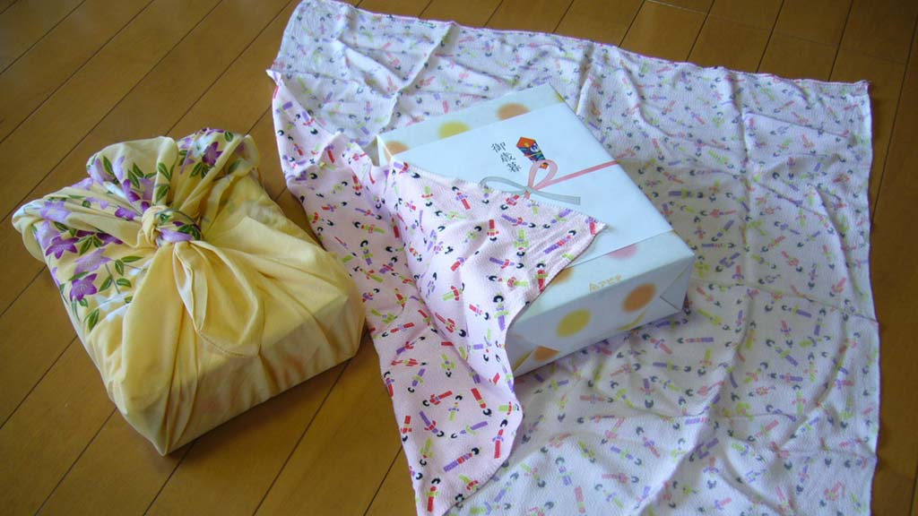 Box wrapped with folded cloth