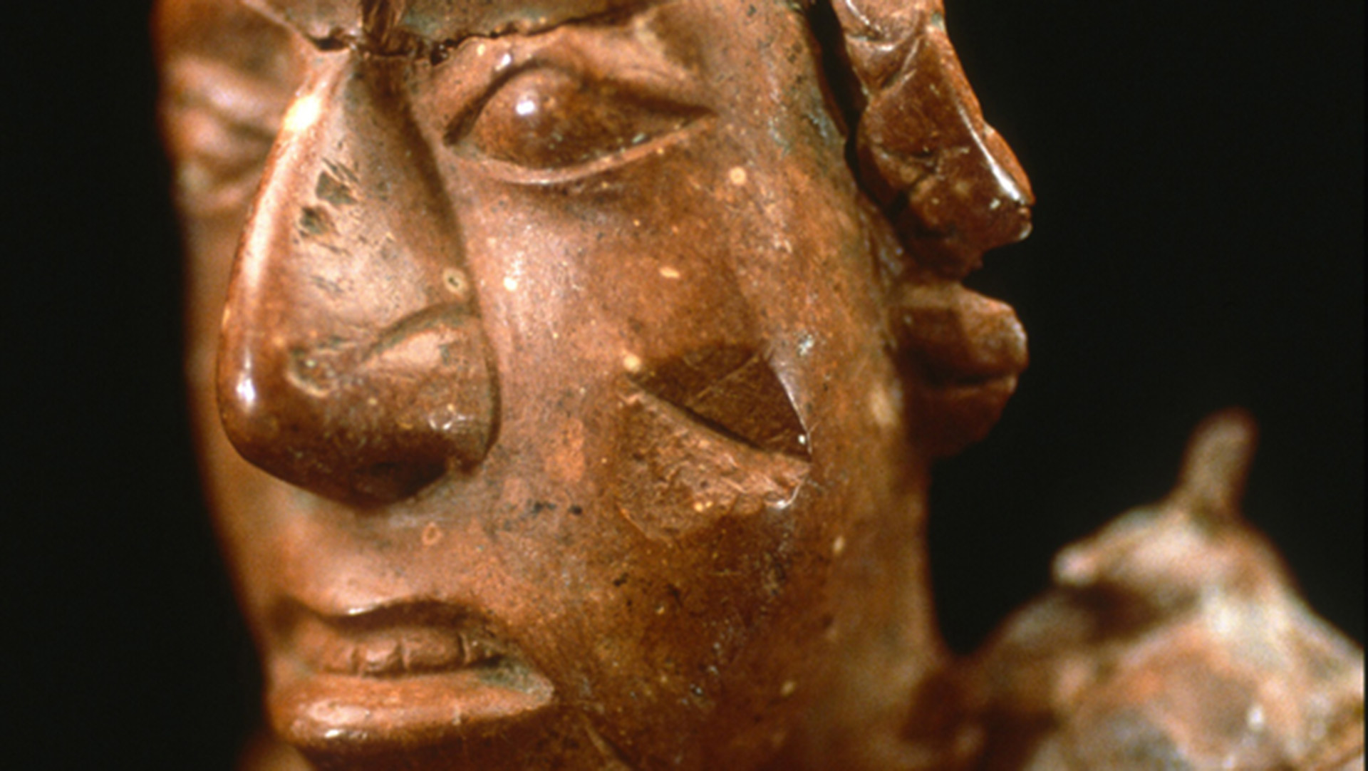 Close-up of the face of a Cahokian figurine called the Birger figure.