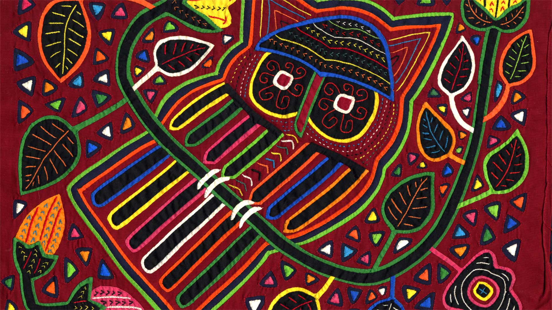 quilt of an owl and leaves on a vine