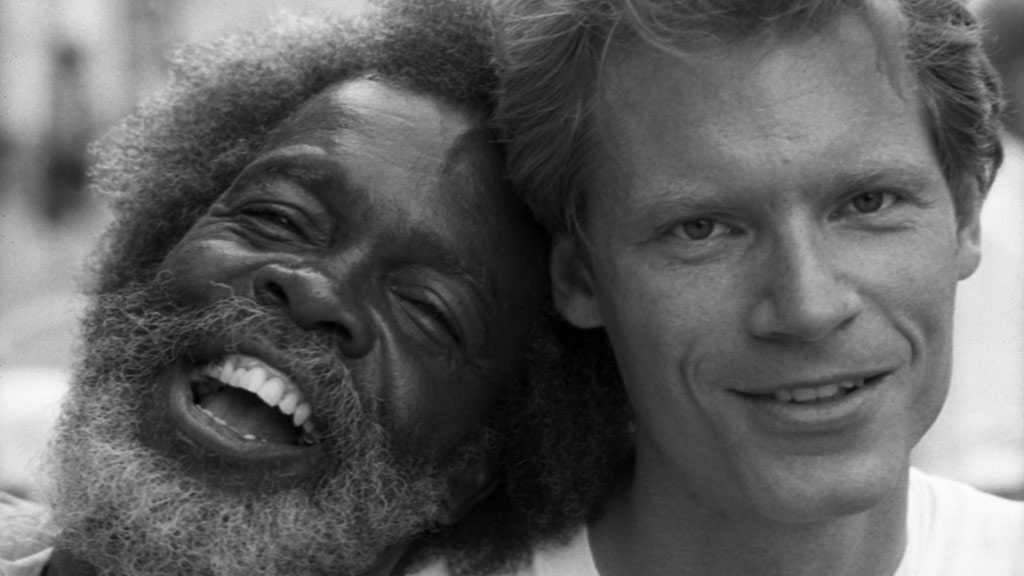 Satan and Adam side by side.