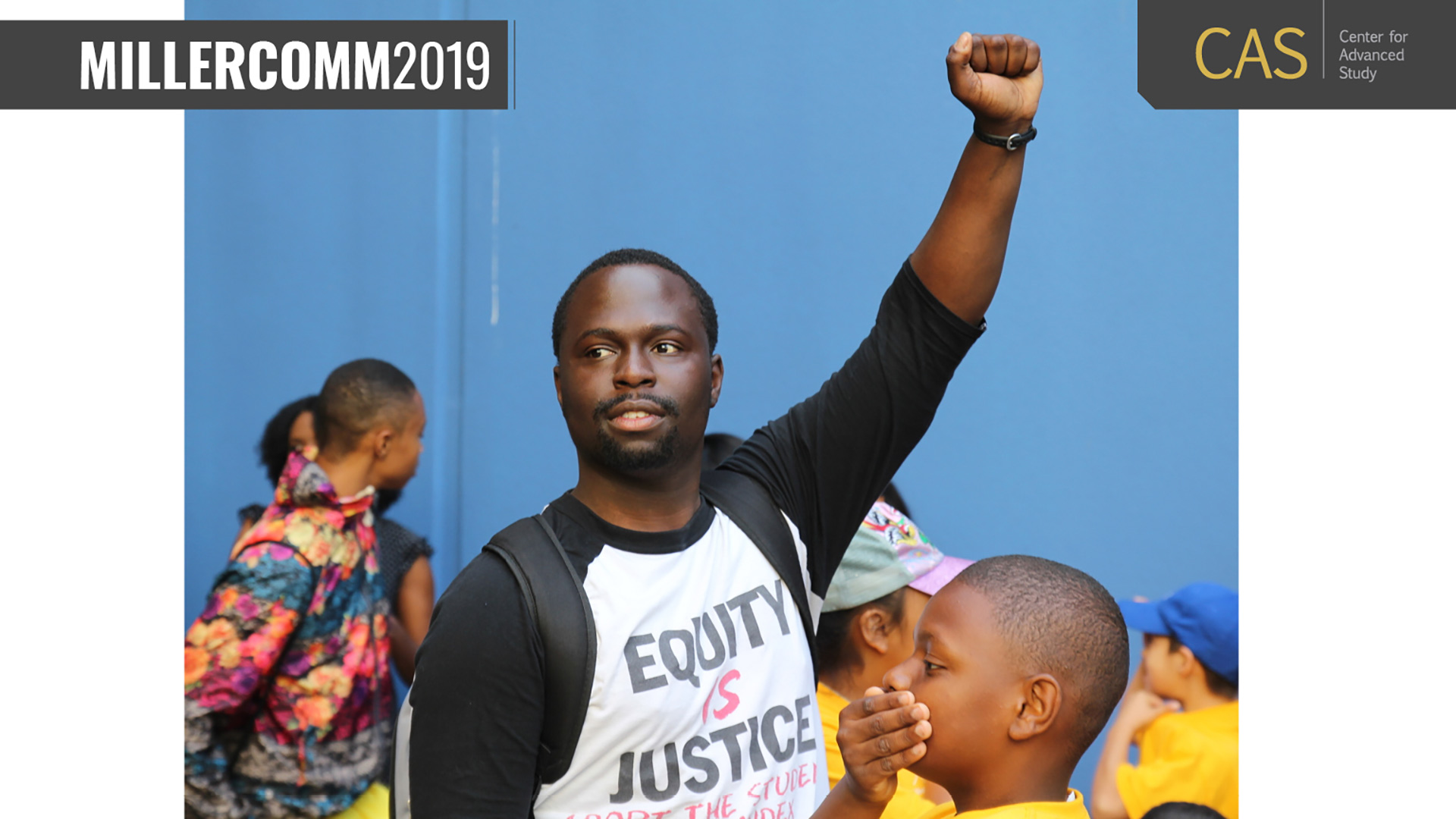 MillerComm 2019, with man holding fist in the air.