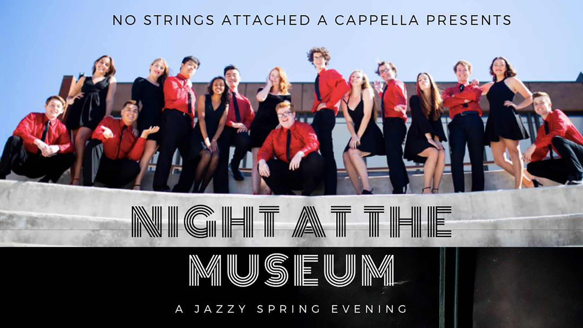 group shot of No Strings A Cappella on the top step of a concrete theater