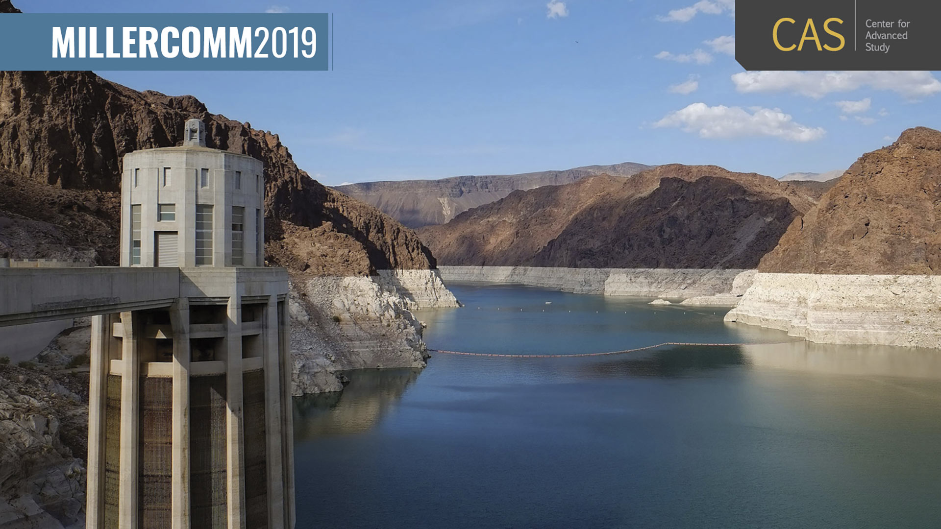 photo of dam and reservoir in an arid landscape