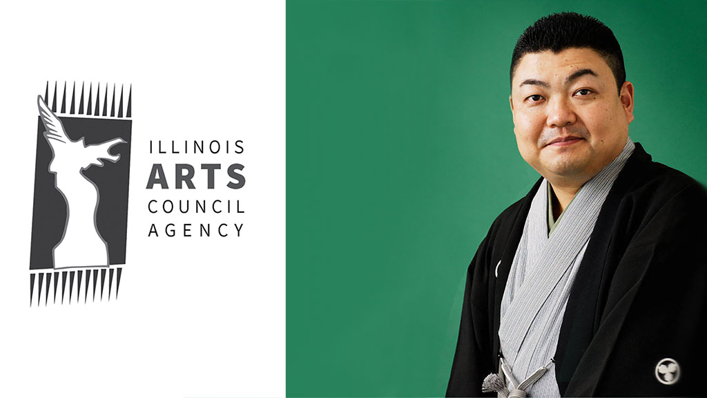 Japanese man in kimono poses for studio photo. Illinois Arts Council Agency logo.