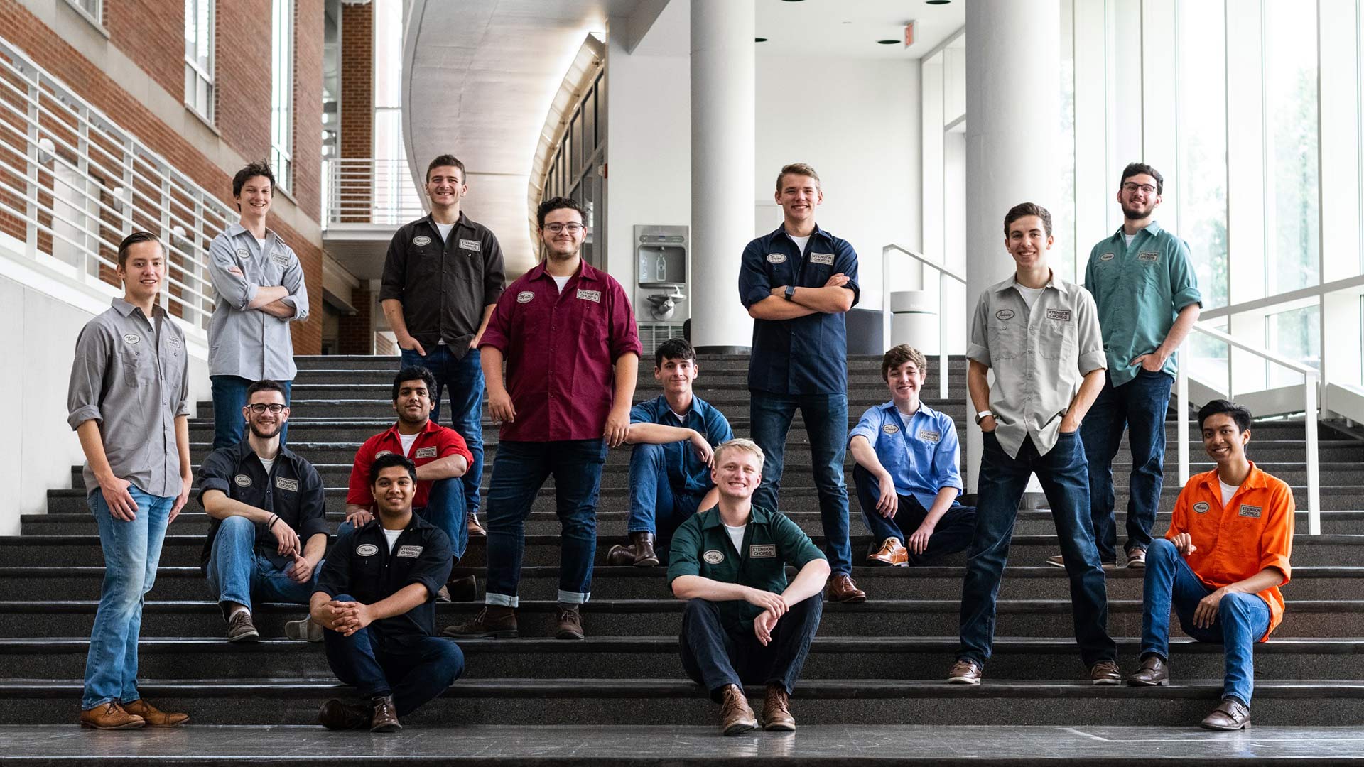 Xtension Chord members posing on steps