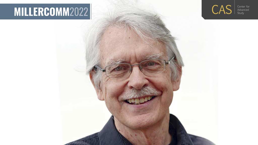 man with glasses smiling