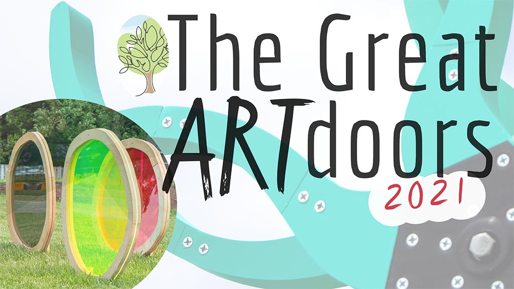 The Great ARTdoors 2021 banner with large colored lens outdoor art installation