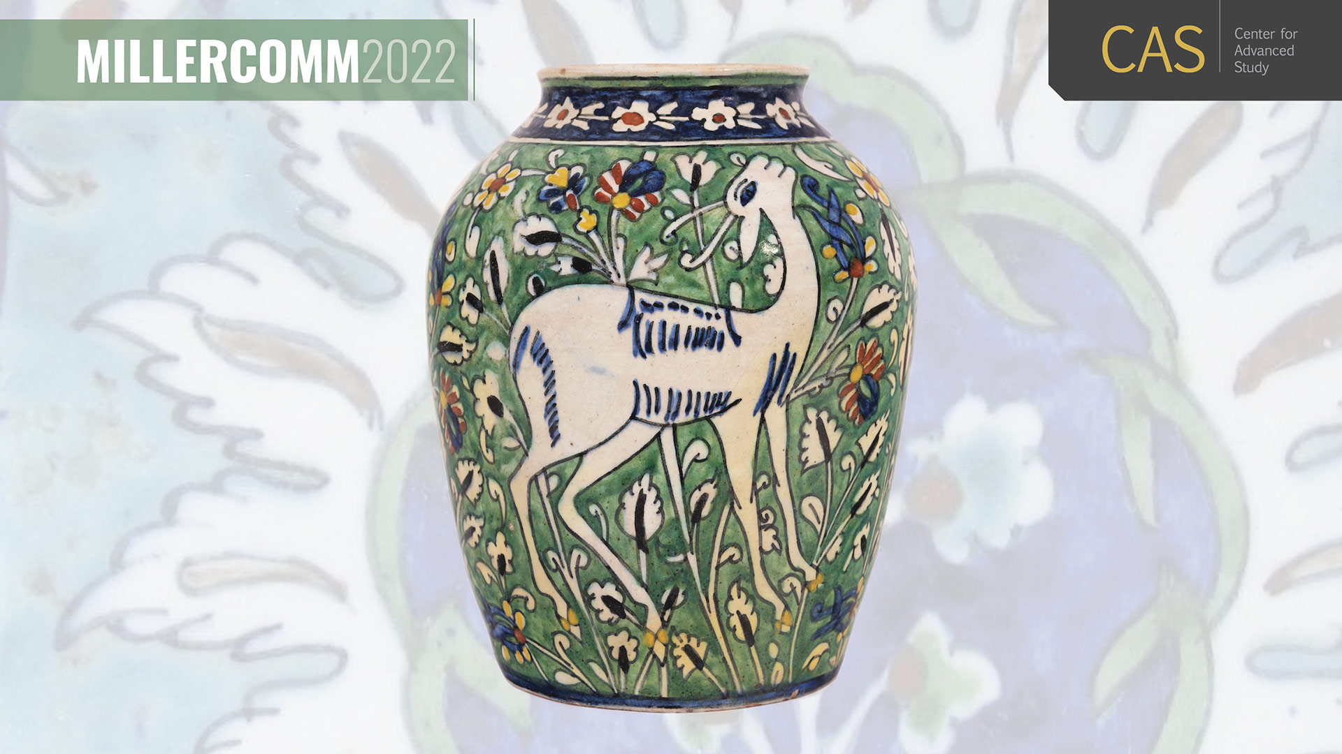 green ceramic vase with white goat surrounded by flowers