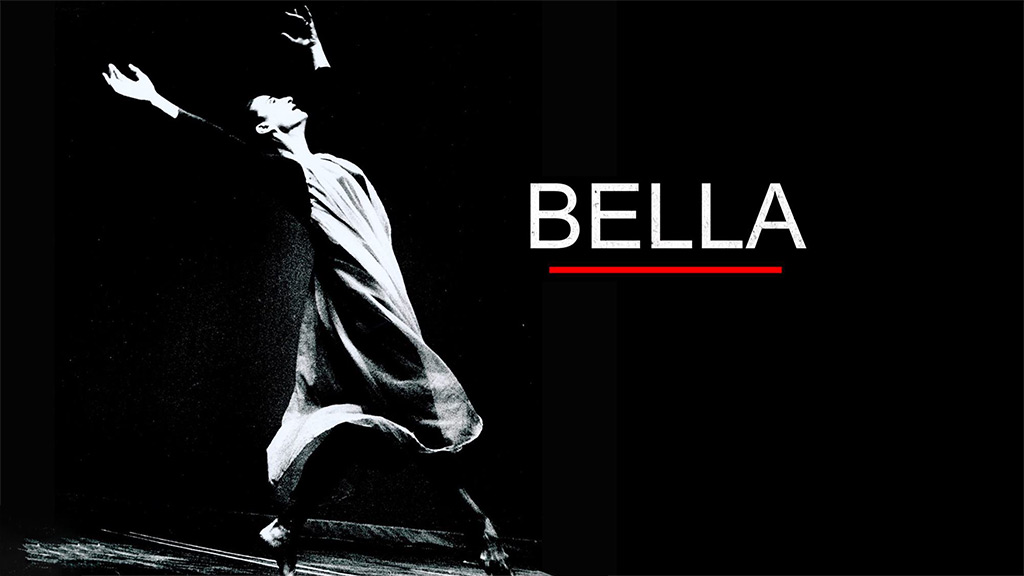stylized black and white photo of a woman dancing on a stage with arms outstretched and text "Bella"