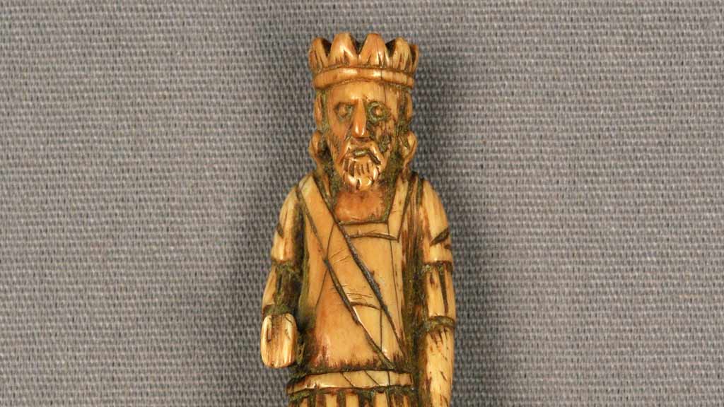 photo of a small, wooden king statue