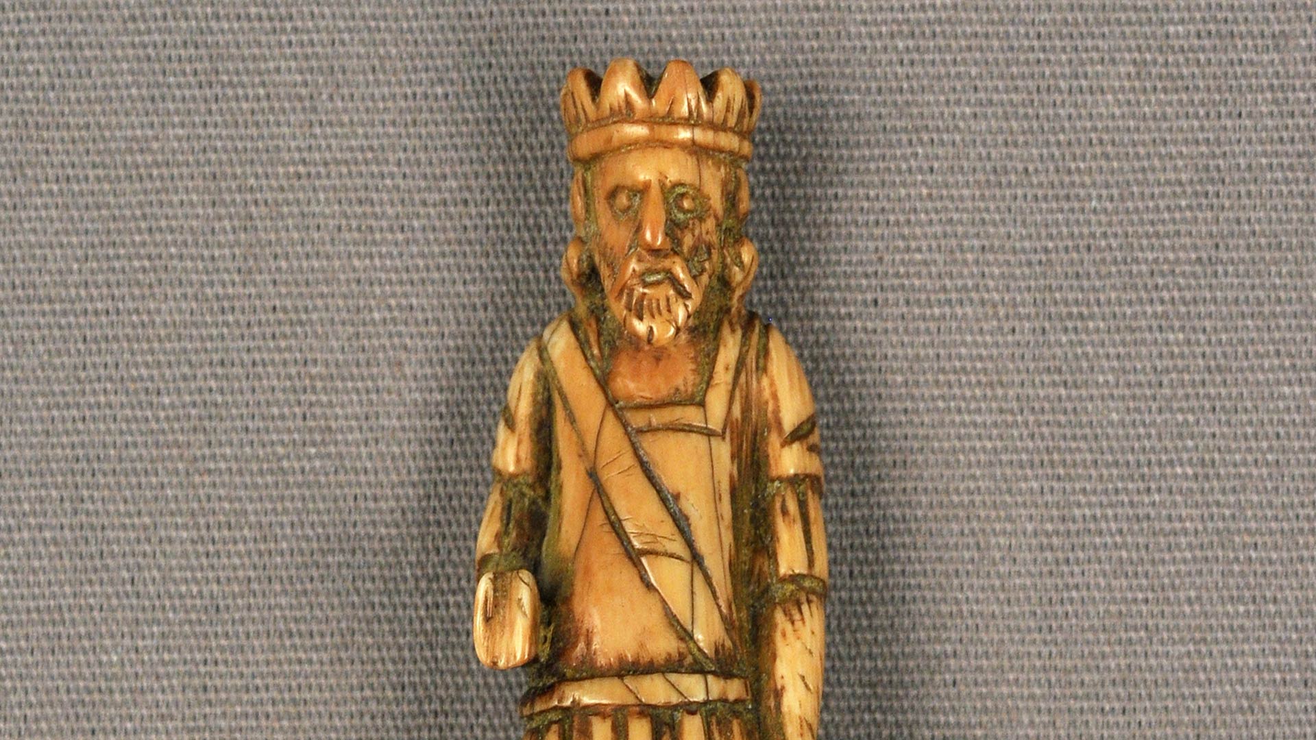 photo of a small, wooden king statue