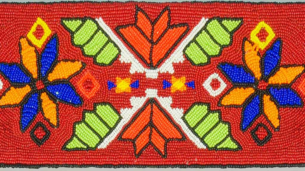 multicolored geometric pattern in beadwork