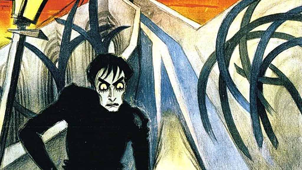 stylized drawing of a man with black hair and pale green skin