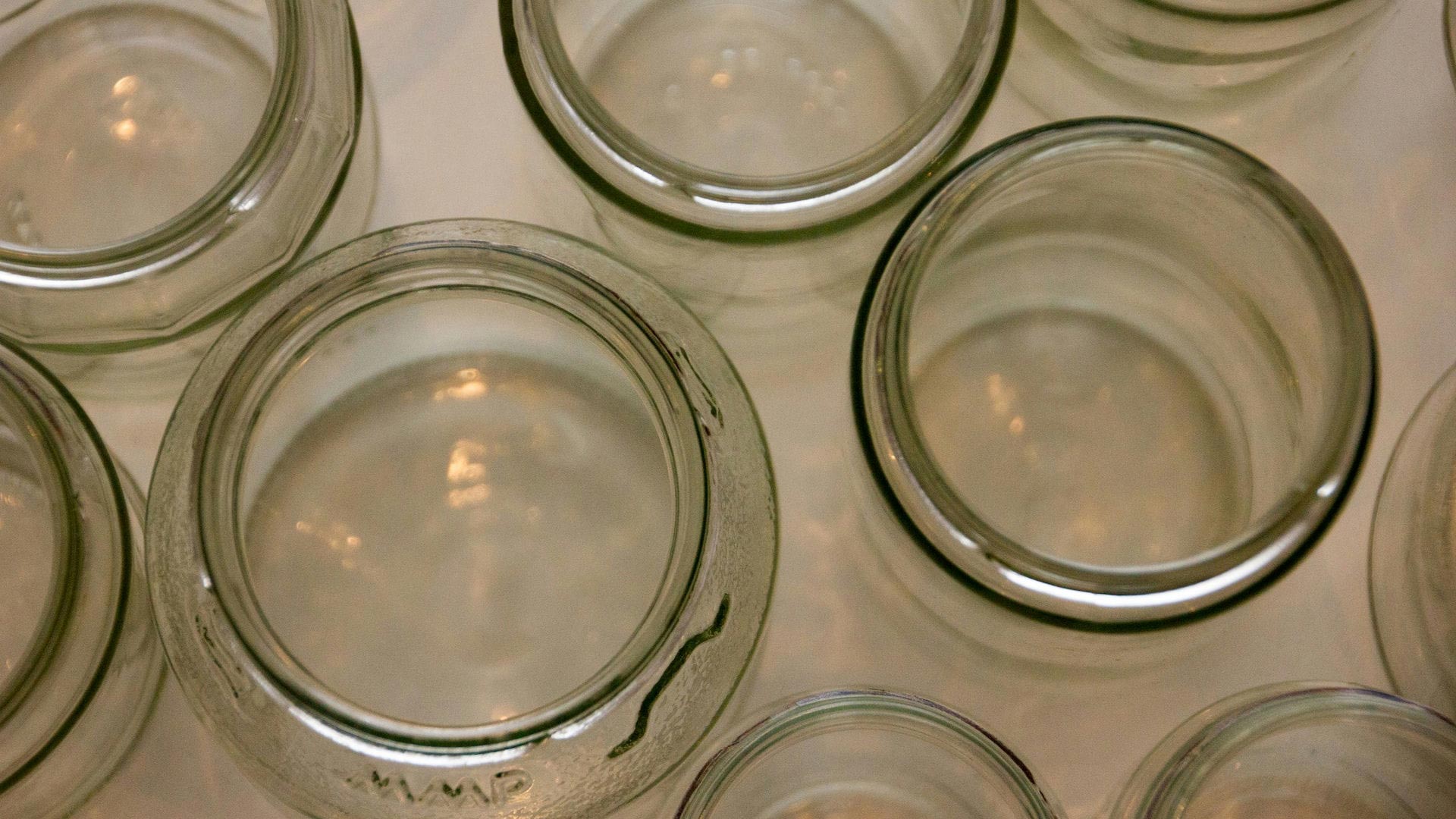 topside view of multiple empty glass jars