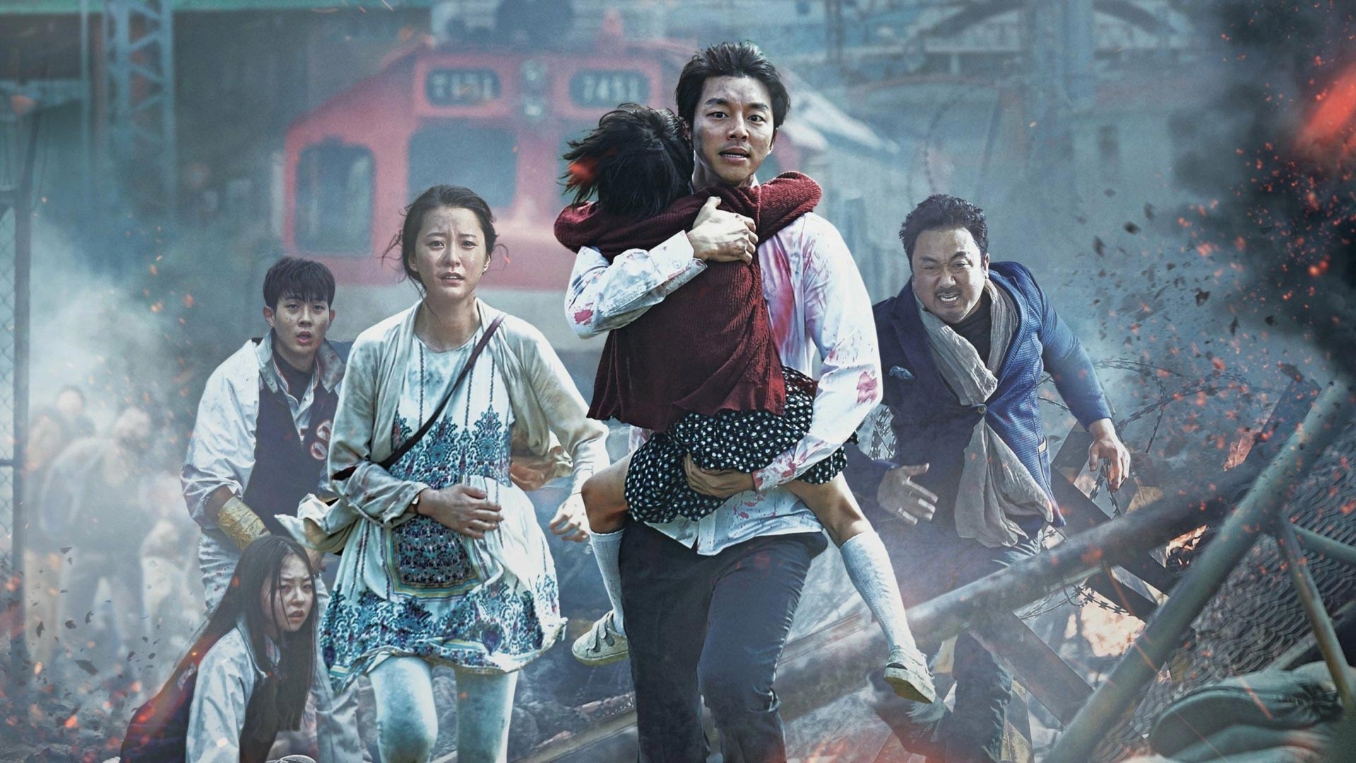 A man holding a child and four others running from zombies in an area full of rubble and smoke.