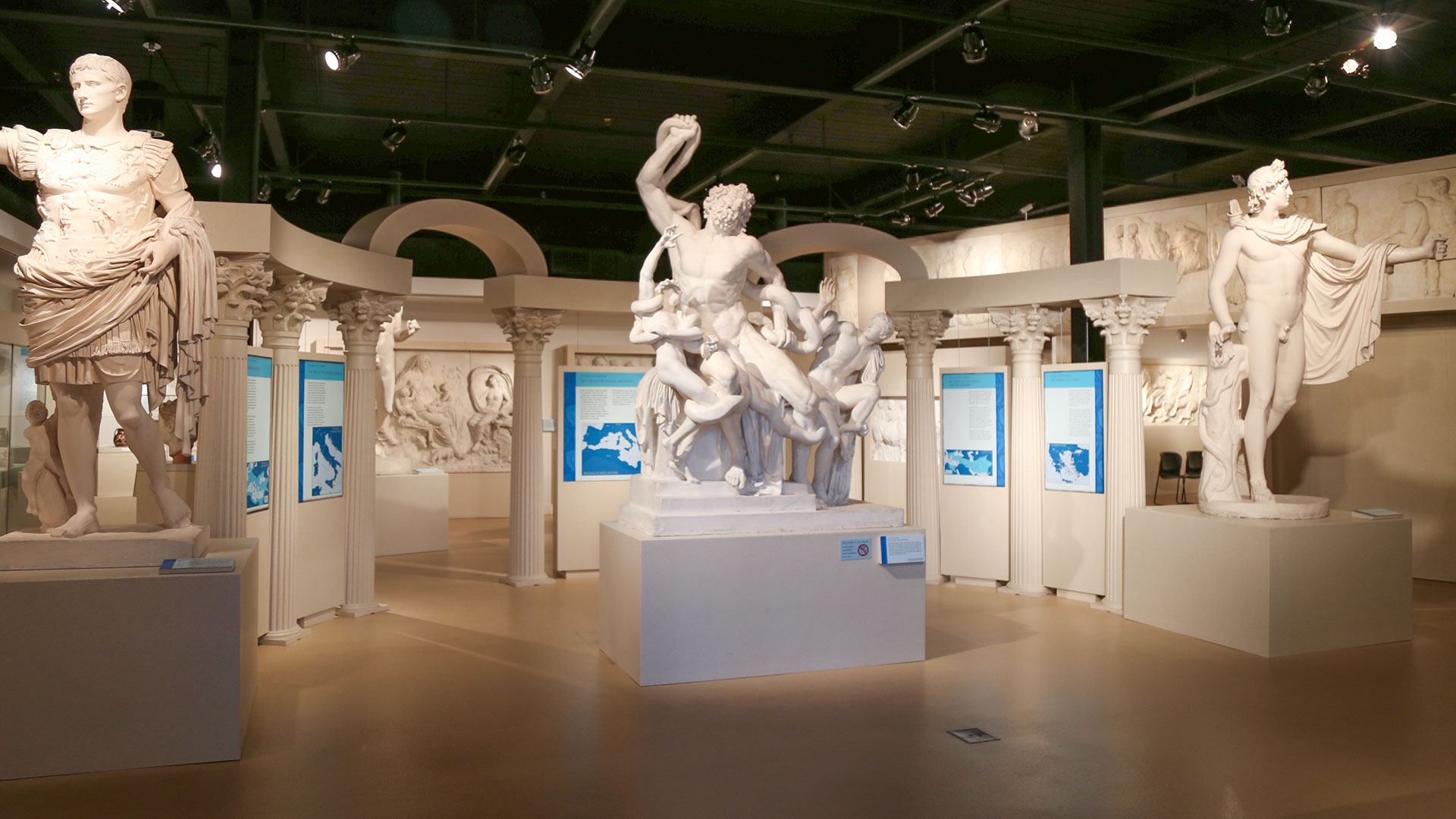 overview of the ancient Mediterranean exhibit with three large featured plaster cast statues