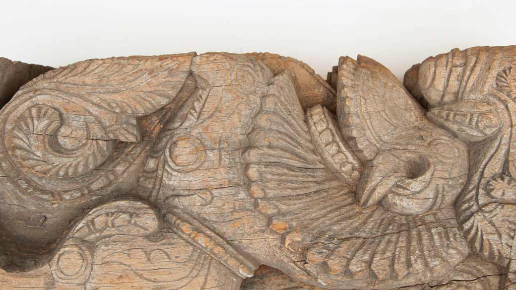 detailed close up of a carved wooden statue