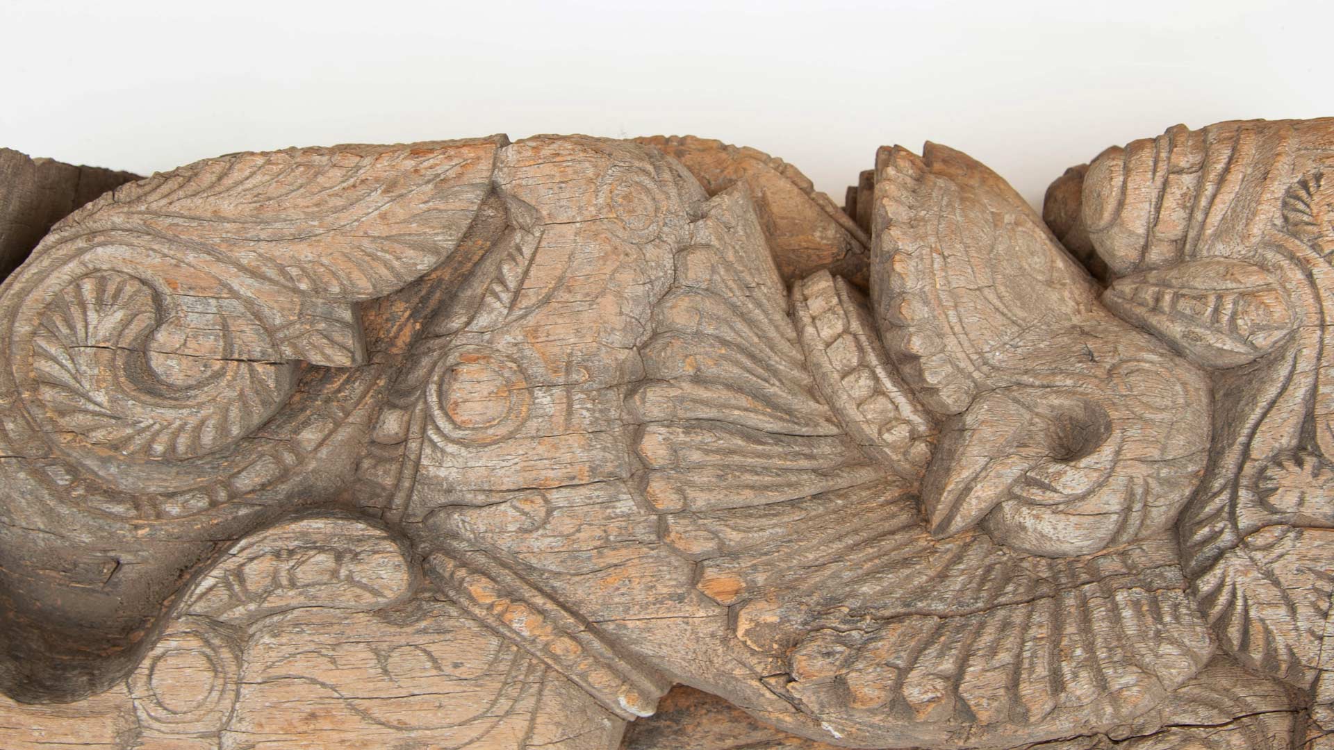 detailed close up of a carved wooden statue