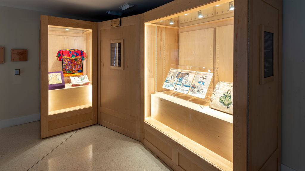 A overview photo of the Women's Networks exhibit showing the artifacts on display.