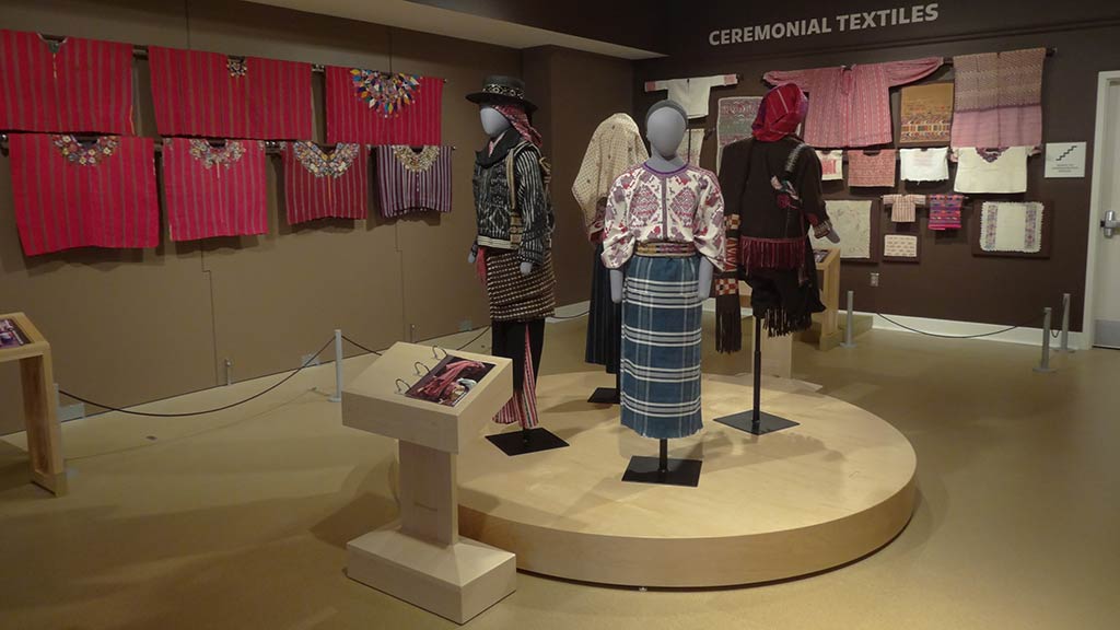 traditional maya clothes on the wall and on models