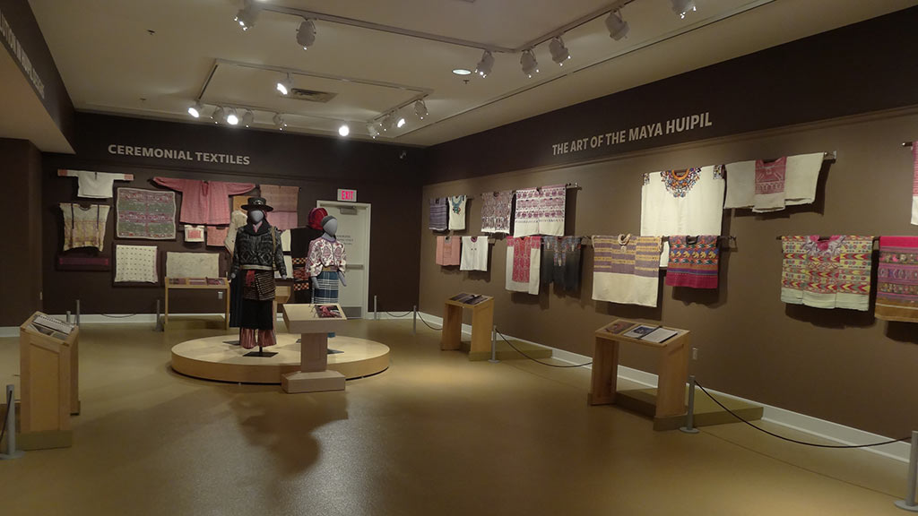 Maya clothing hanging on display and on models