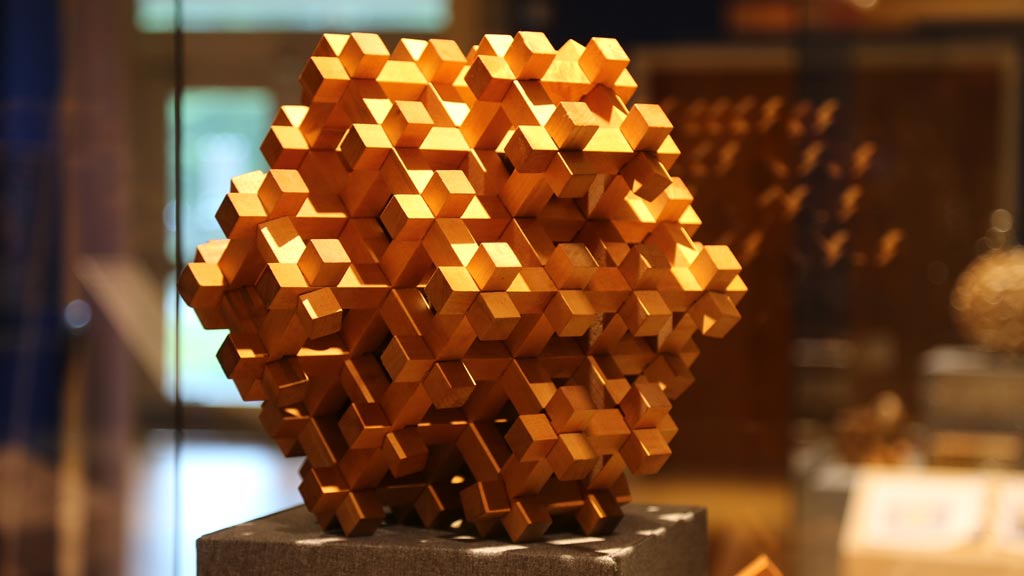 closeup of wooden cubes in a puzzle