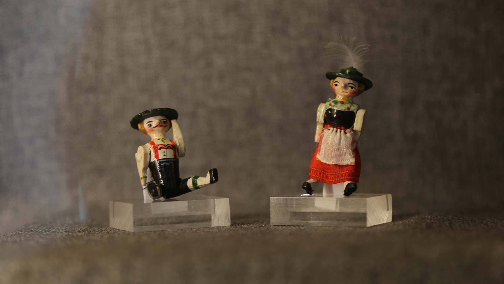 pair of wooden dolls, one male and one female