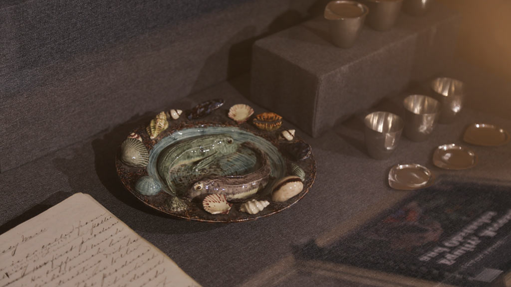 close-up of a small bowl lined with shells at the top