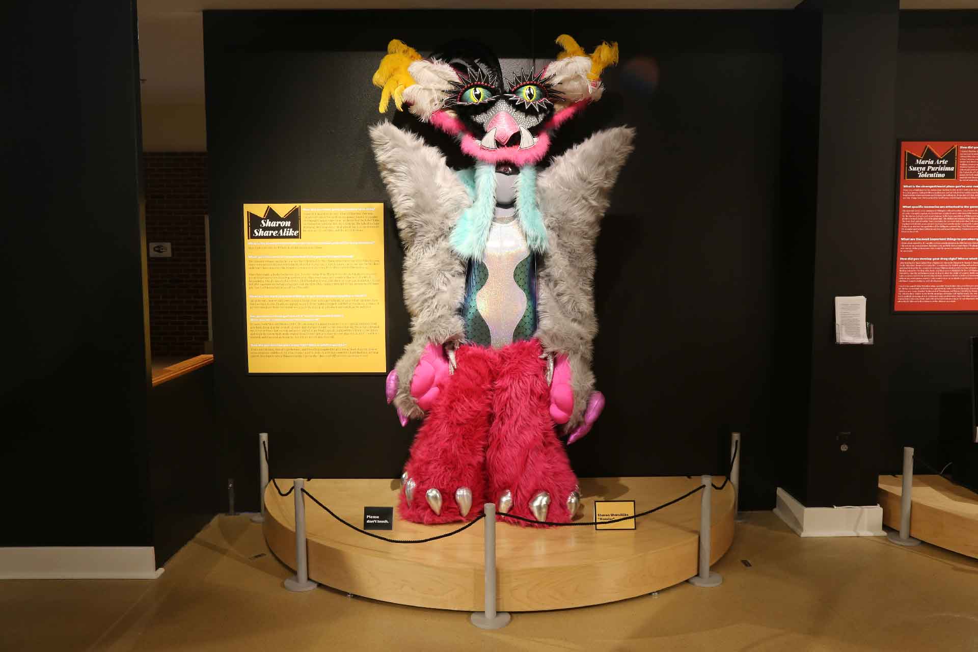 large colorful furry animal themed drag costume