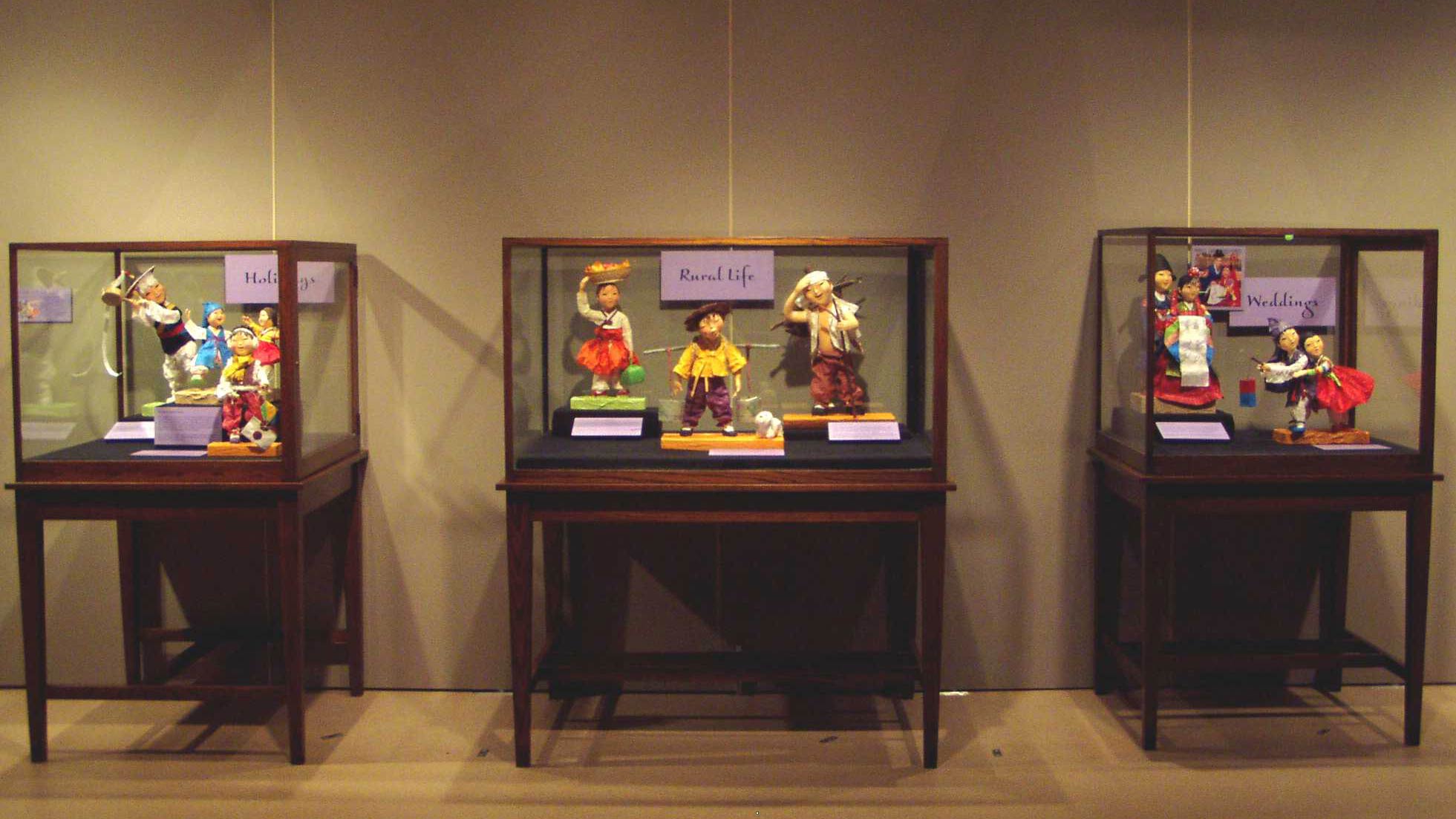 Korean dolls in glass case outlet