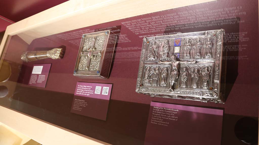 metal cases with relief sculpture and metal hand