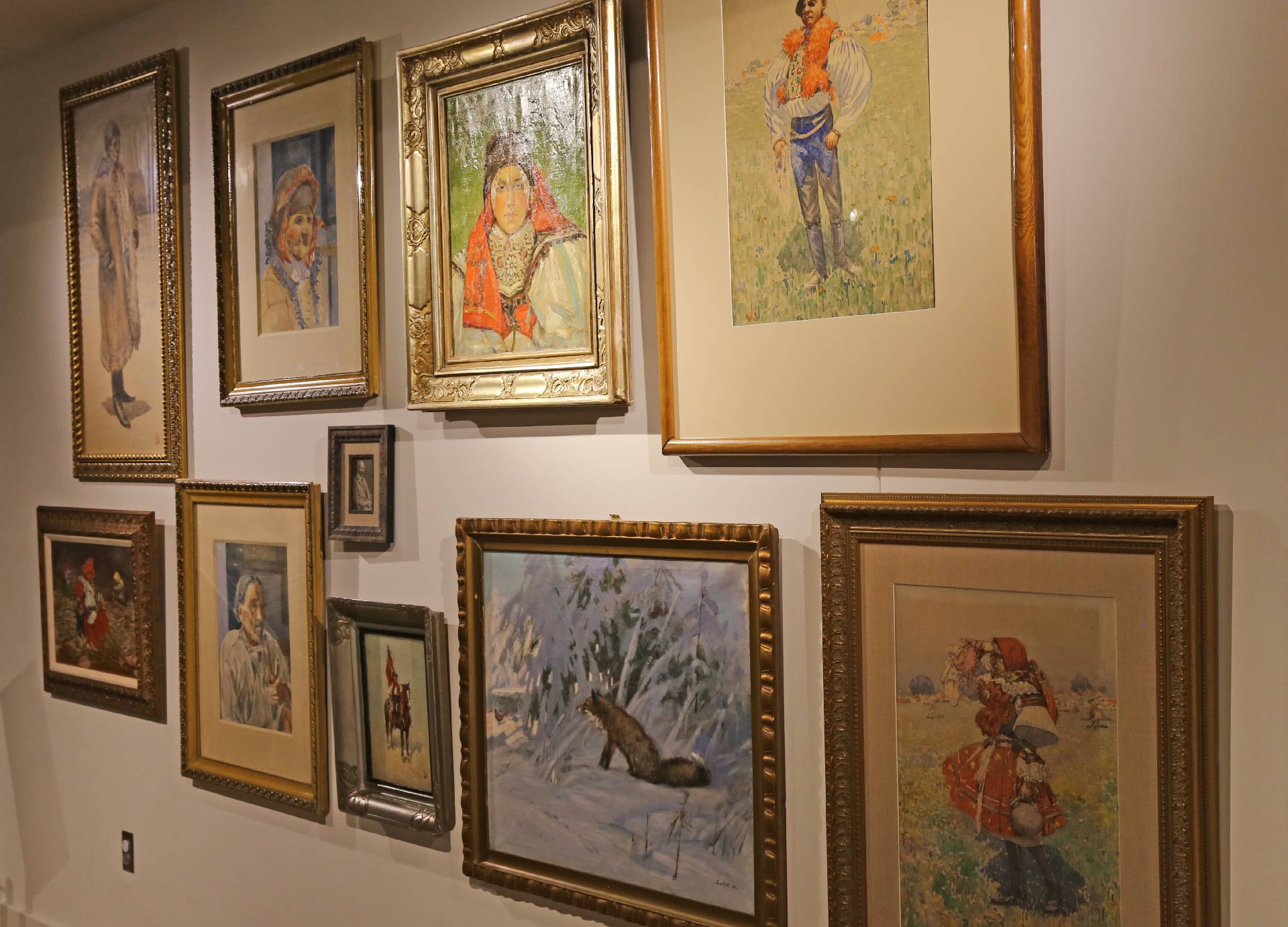angled view of the paintings in the exhibit