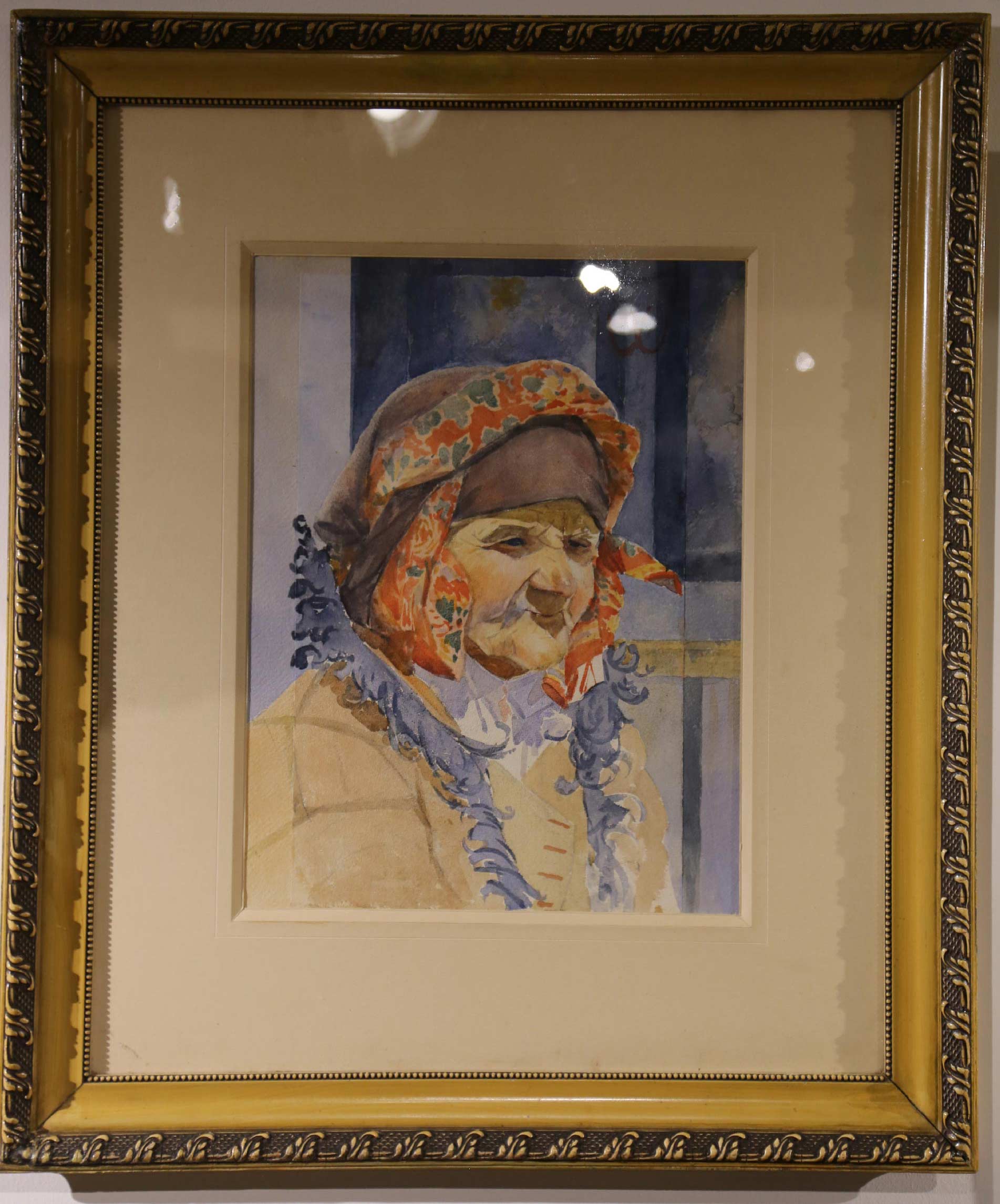 painting of a woman wearing an orange head covering another head covering