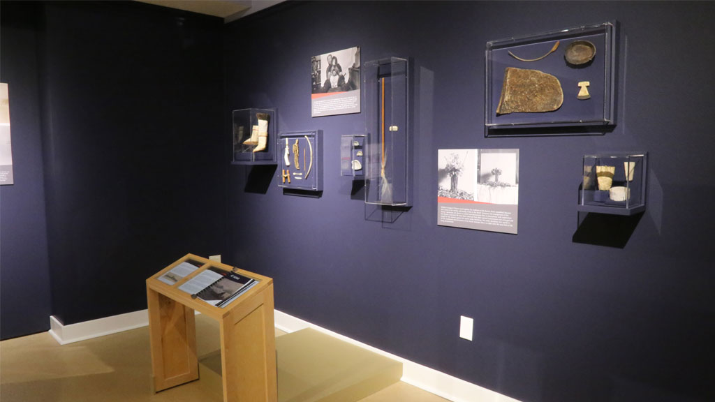 wooden artifacts displayed on the wall