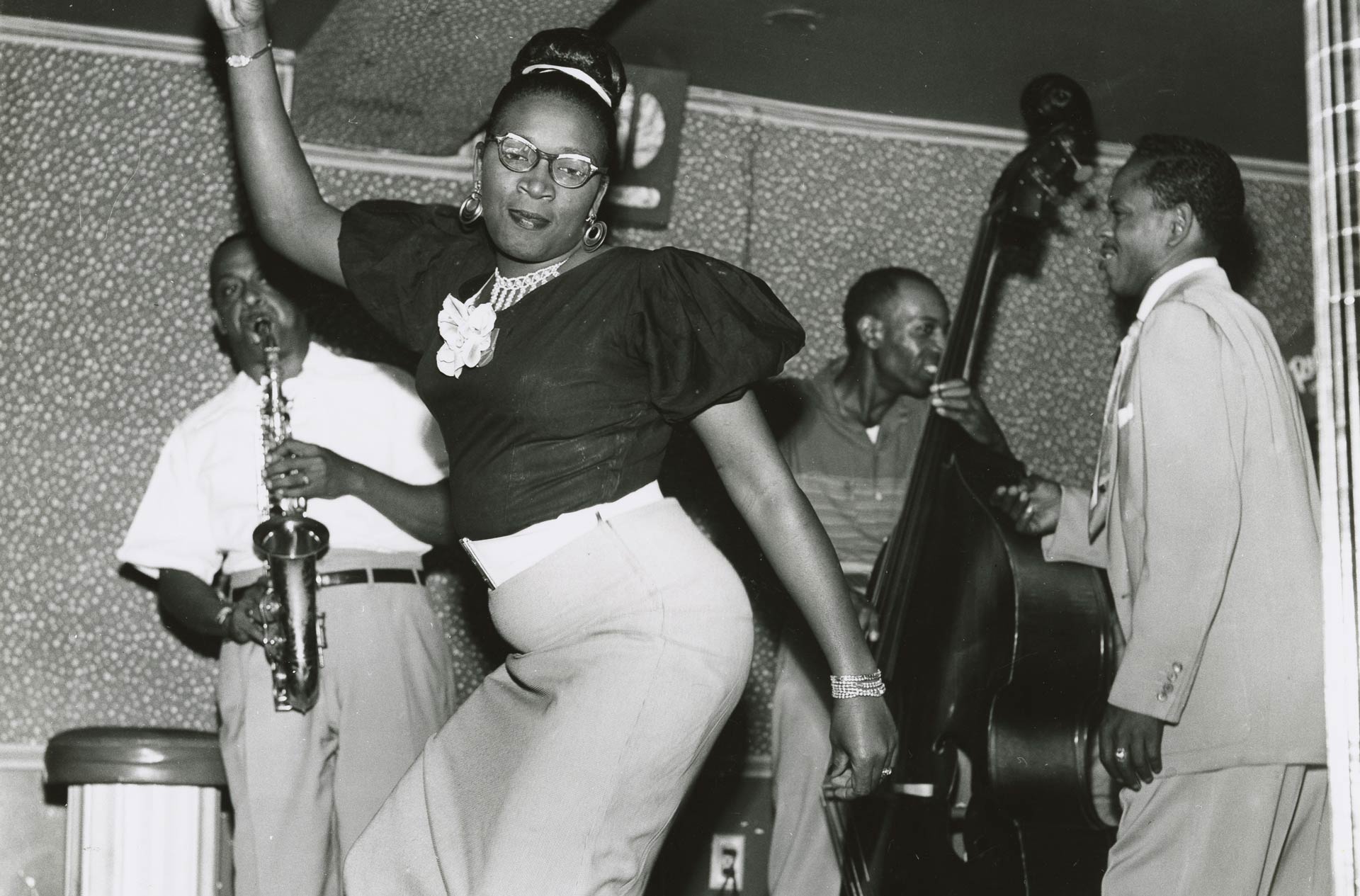 black and white photograph of a woman dancing