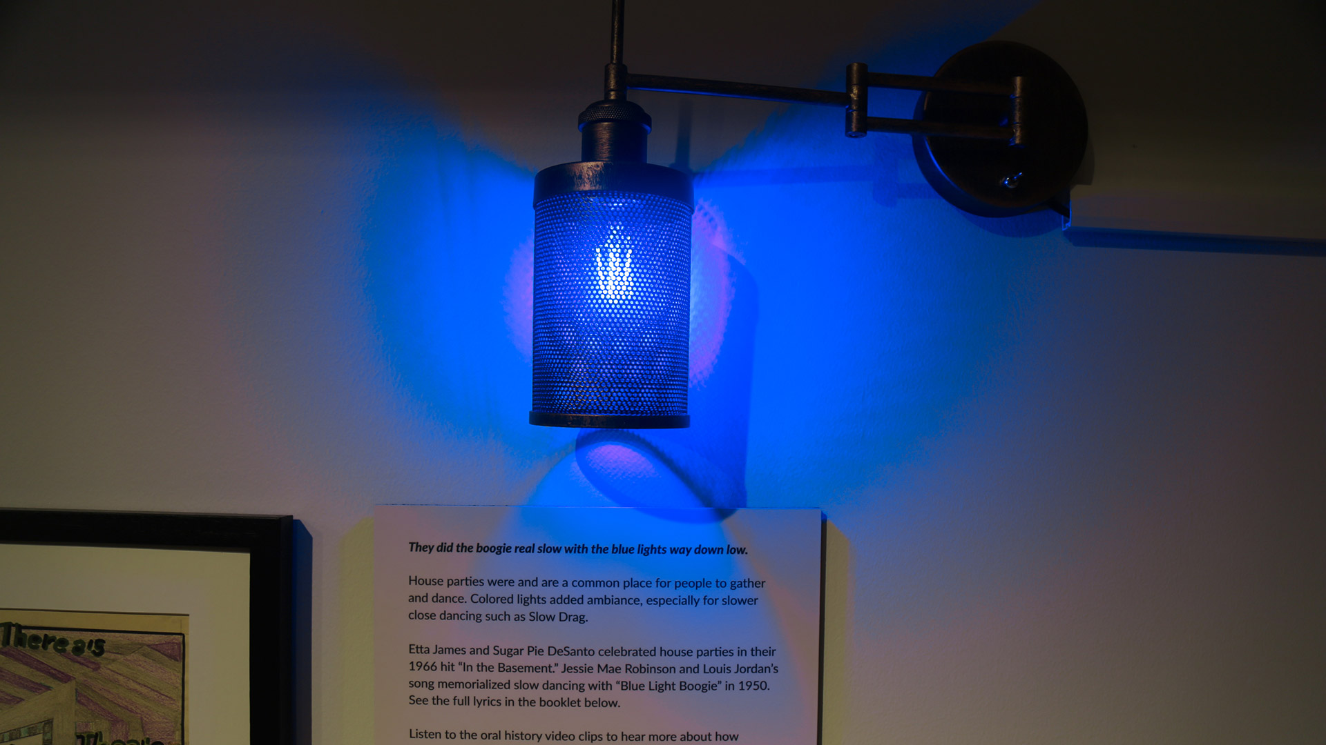 a blue light mounted on wall