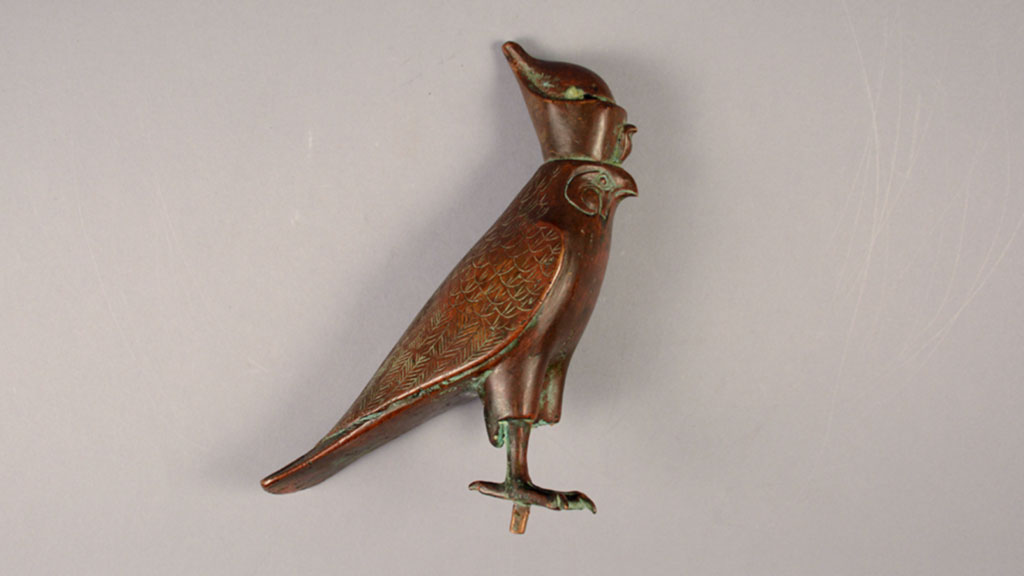 small bronze bird figure