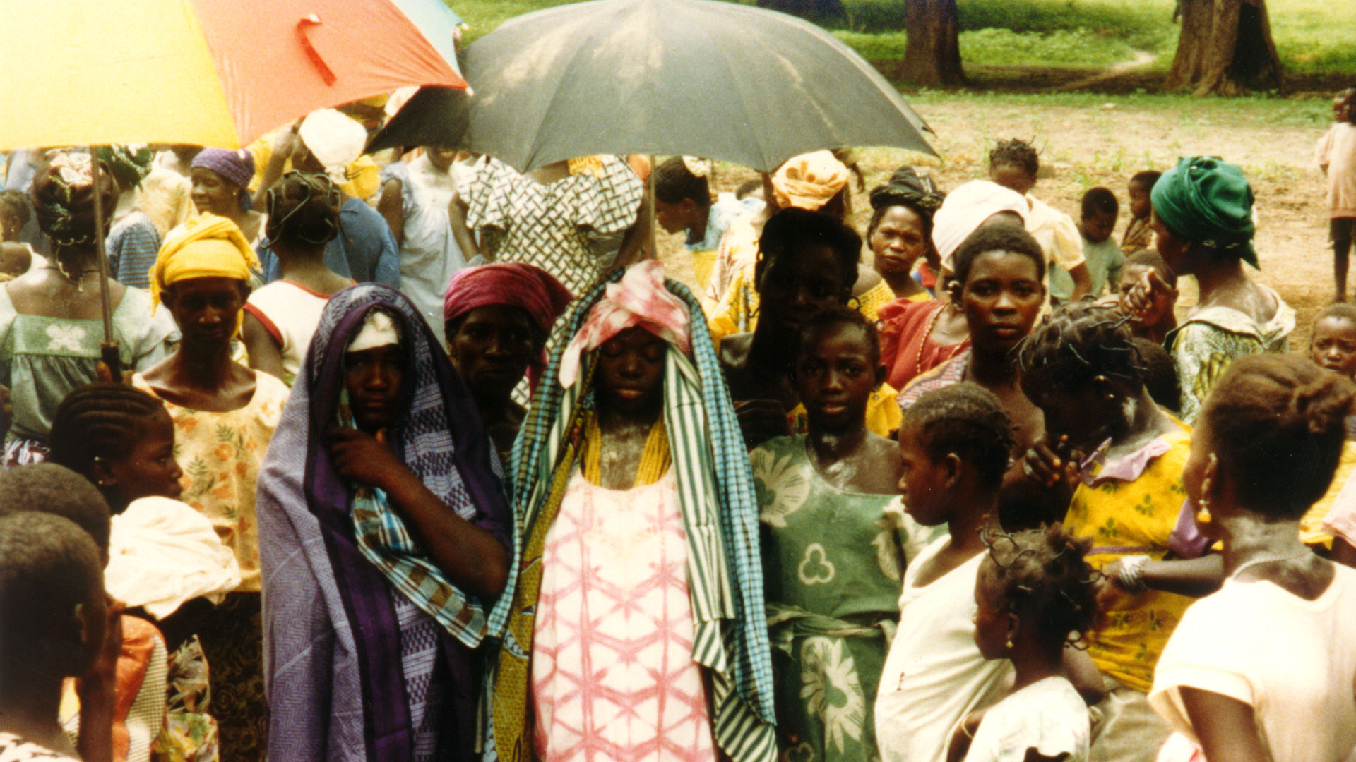 women surrounding a bride