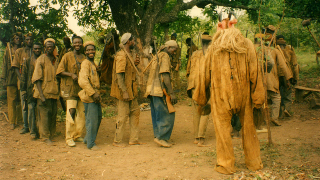 men gathered around for the hunter's dance