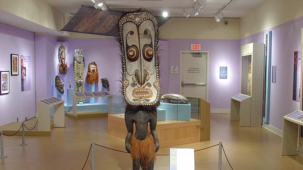 large figure with a big mask for a head